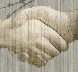 A handshake of kindness to a refugee.